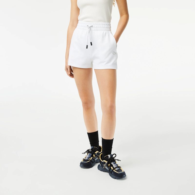 Женские однотонные шорты Lacoste 5