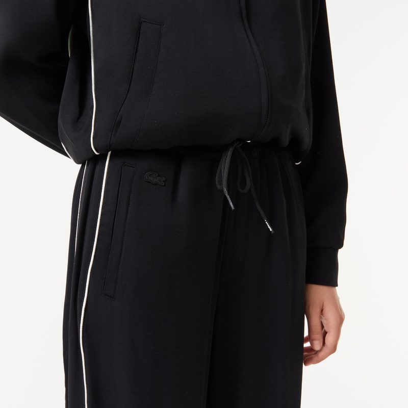Женские спортивные брюки Lacoste широкого кроя 5