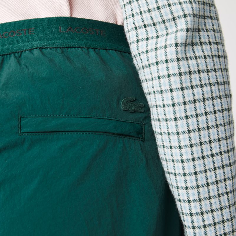 Женские легкие спортивные брюки Lacoste 4