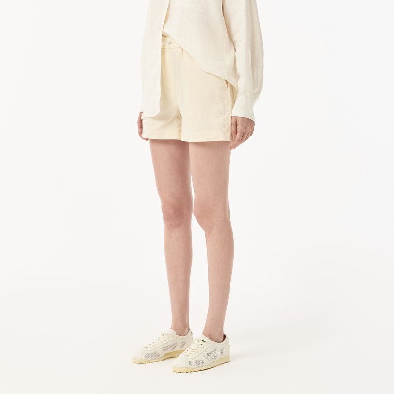 Женские короткие однотонные шорты Lacoste 3