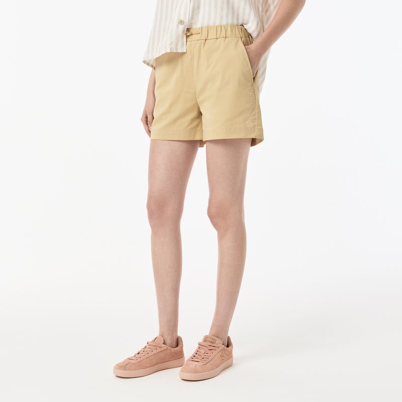 Женские короткие однотонные шорты Lacoste 3