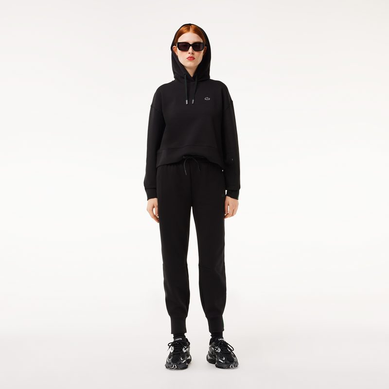 Женские спортивные брюки Lacoste из хлопка 3