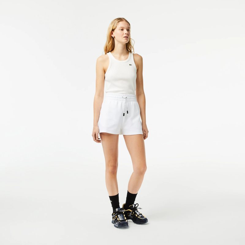 Женские однотонные шорты Lacoste 4