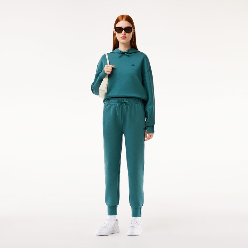 Женские спортивные брюки Lacoste из хлопка 3