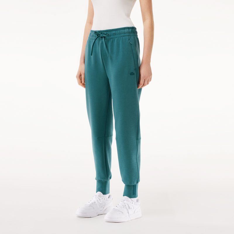 Женские спортивные брюки Lacoste из хлопка 4