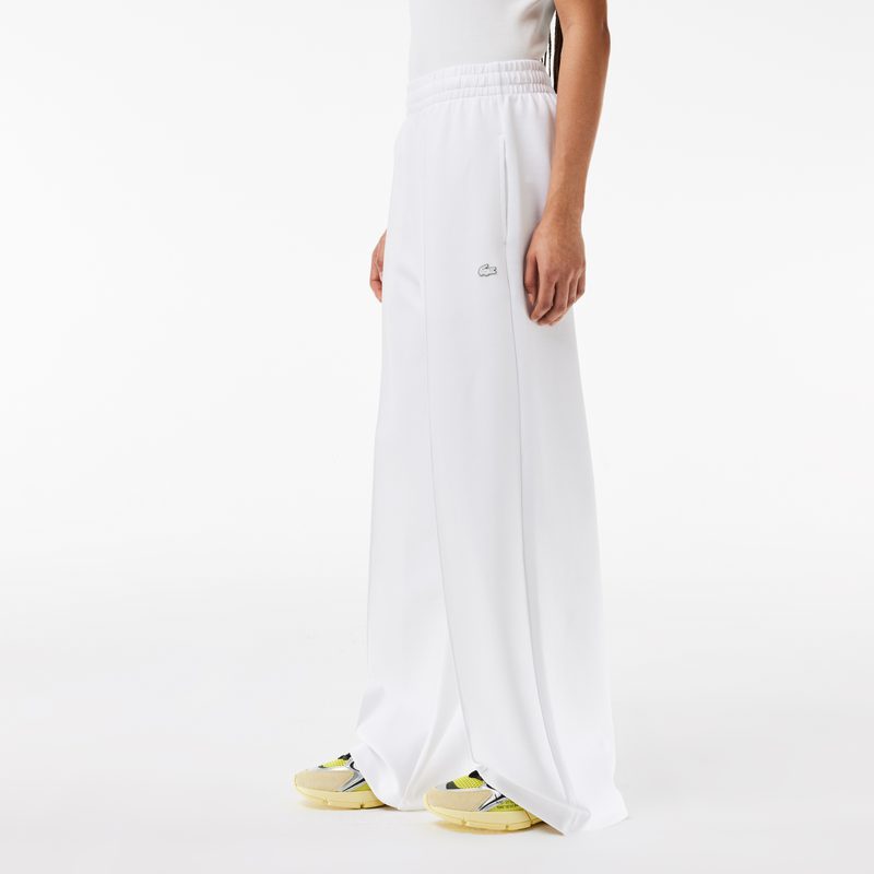 Женские спортивные брюки Lacoste из хлопка 4