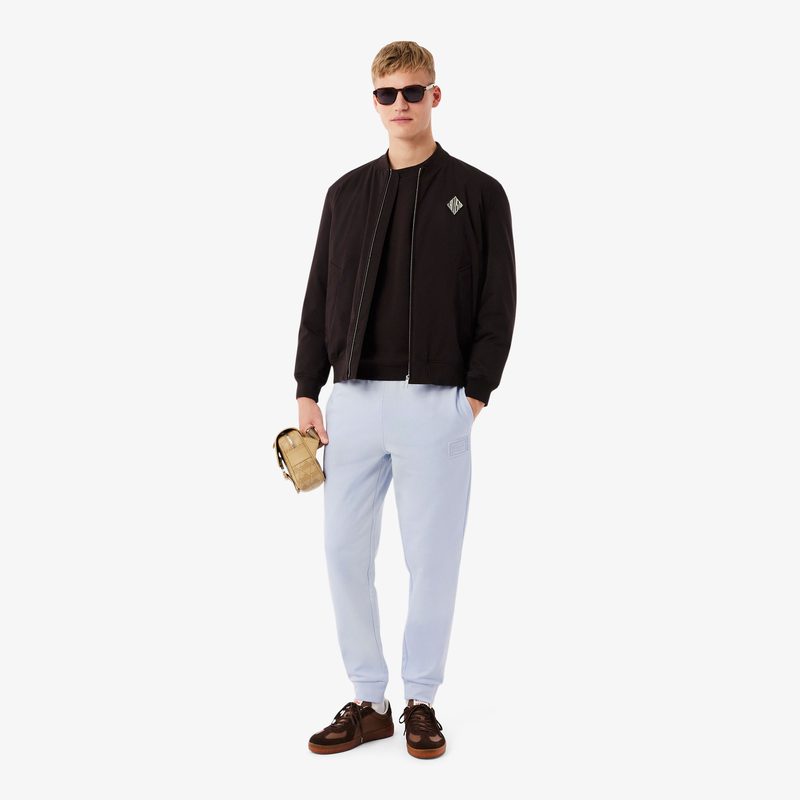 Хлопковые спортивные брюки Lacoste унисекс 4