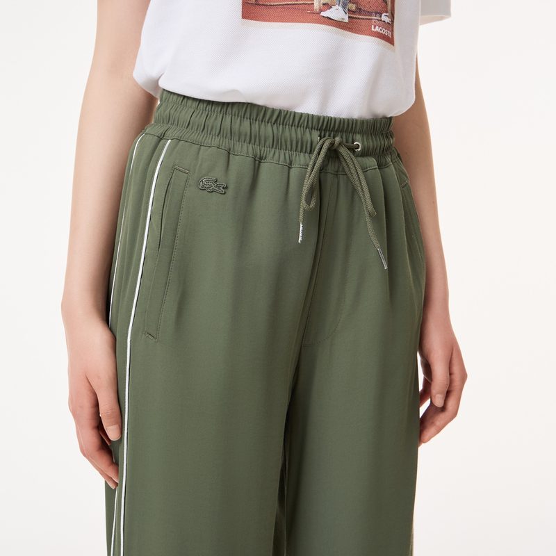 Женские спортивные брюки Lacoste широкого кроя 4