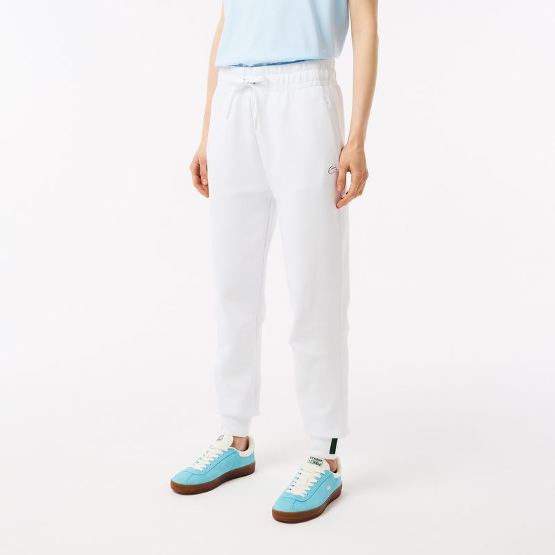 Женские спортивные брюки Lacoste из хлопка 3