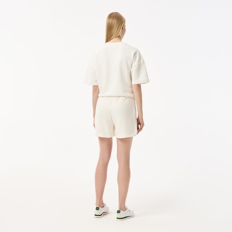 Женские спортивные шорты Lacoste с карманами 2