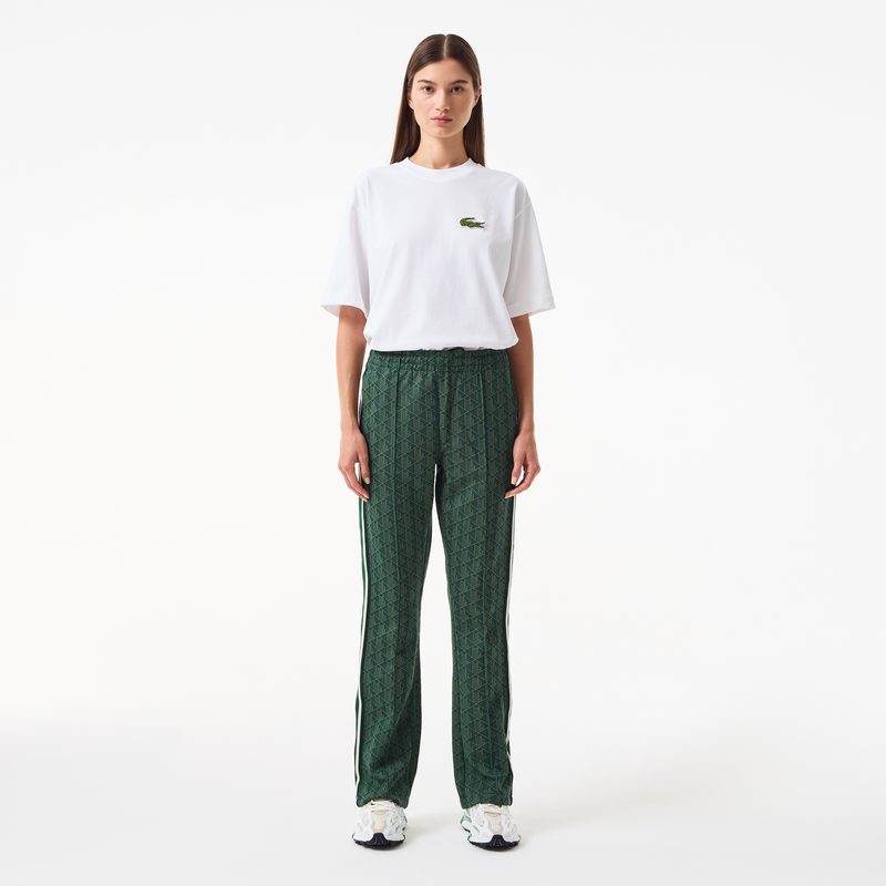 Женские расклешенные спортивные брюки Lacoste с монограммой 4
