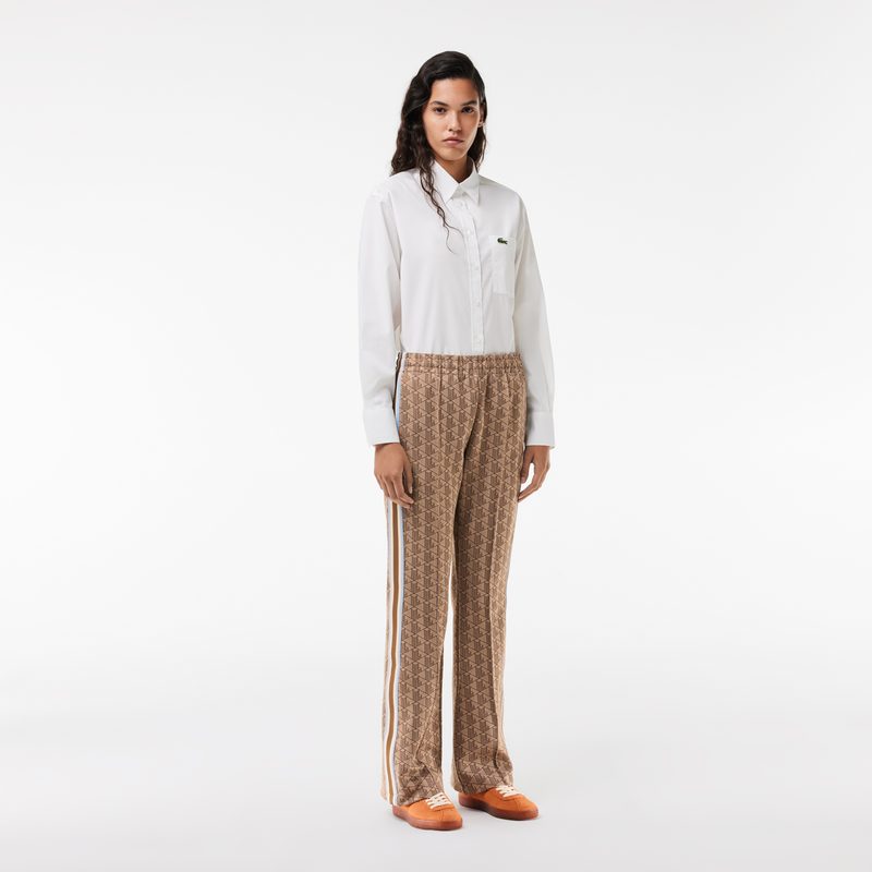 Женские расклешенные спортивные брюки Lacoste с монограммой