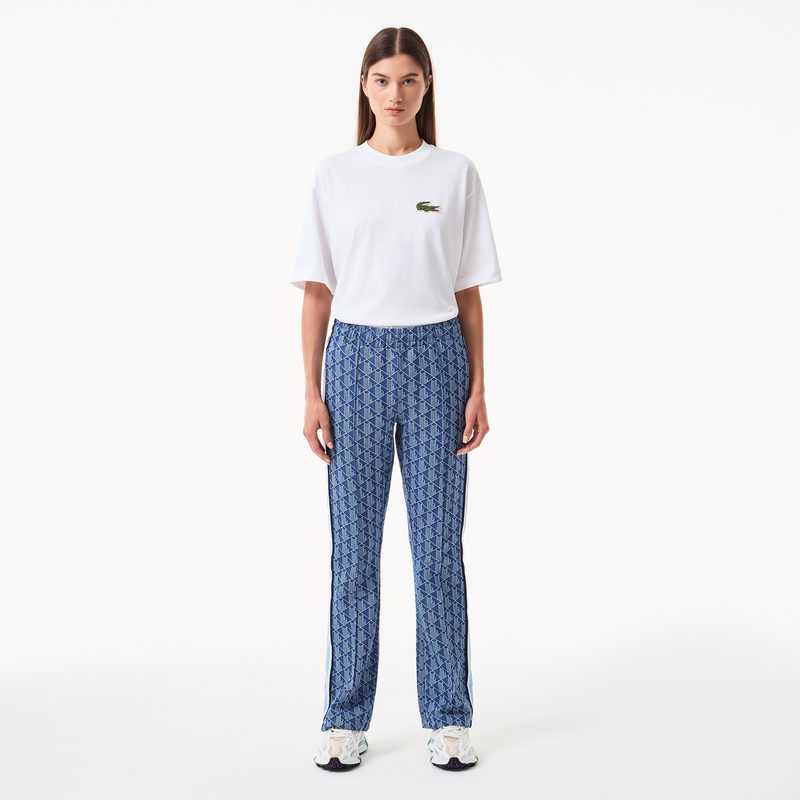 Женские расклешенные спортивные брюки Lacoste с монограммой 4