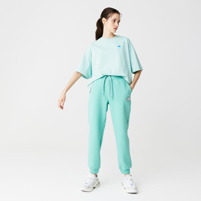 Женские спортивные брюки Lacoste приталенного кроя