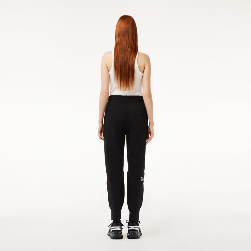 Женские спортивные брюки Lacoste из хлопка 2