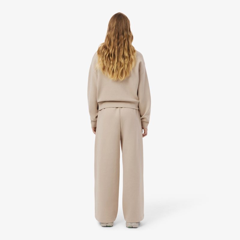 Женские хлопковые спортивные брюки-клёш Lacoste 2