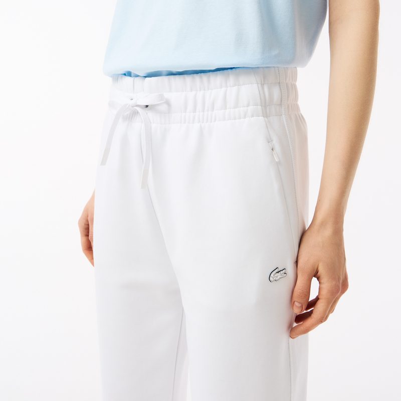 Женские спортивные брюки Lacoste из хлопка 4