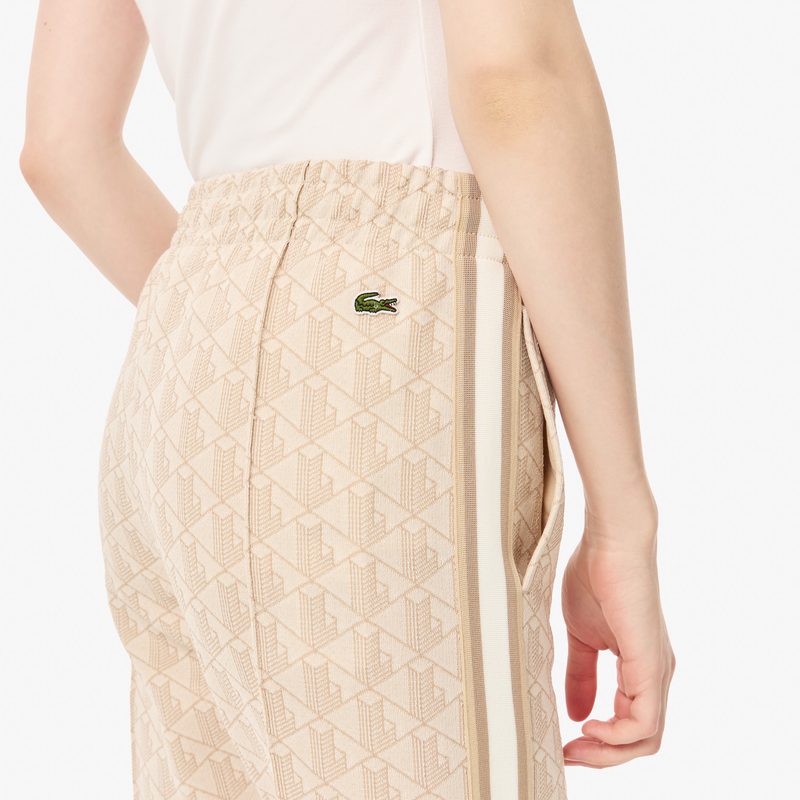 Женские расклешенные спортивные брюки Lacoste с монограммой 4