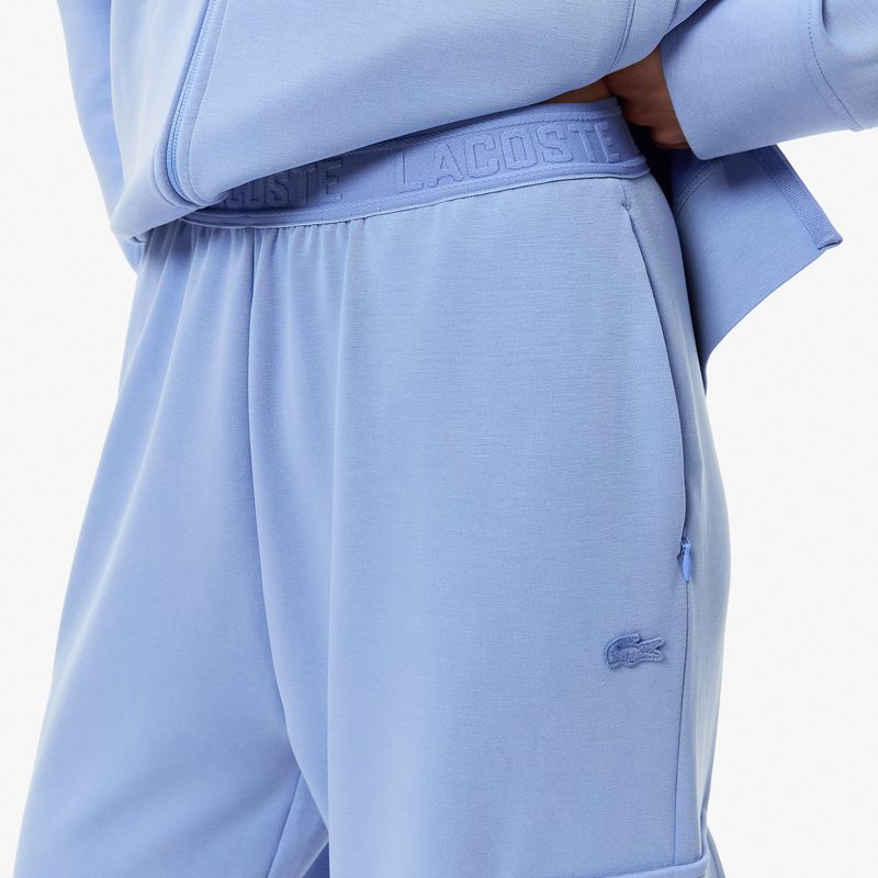 Женские спортивные брюки Lacoste свободного кроя 4