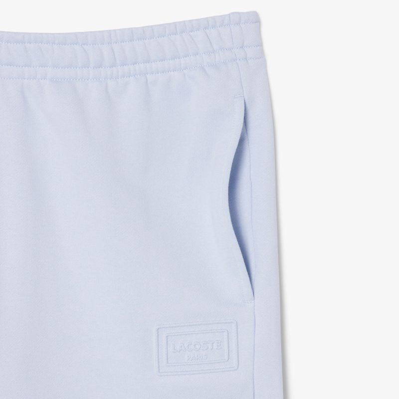 Хлопковые спортивные брюки Lacoste унисекс 5