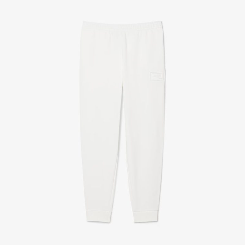 Хлопковые спортивные брюки Lacoste унисекс 4