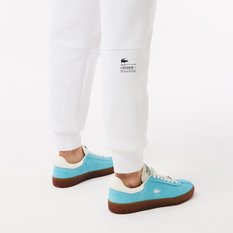 Женские спортивные брюки Lacoste из хлопка 5