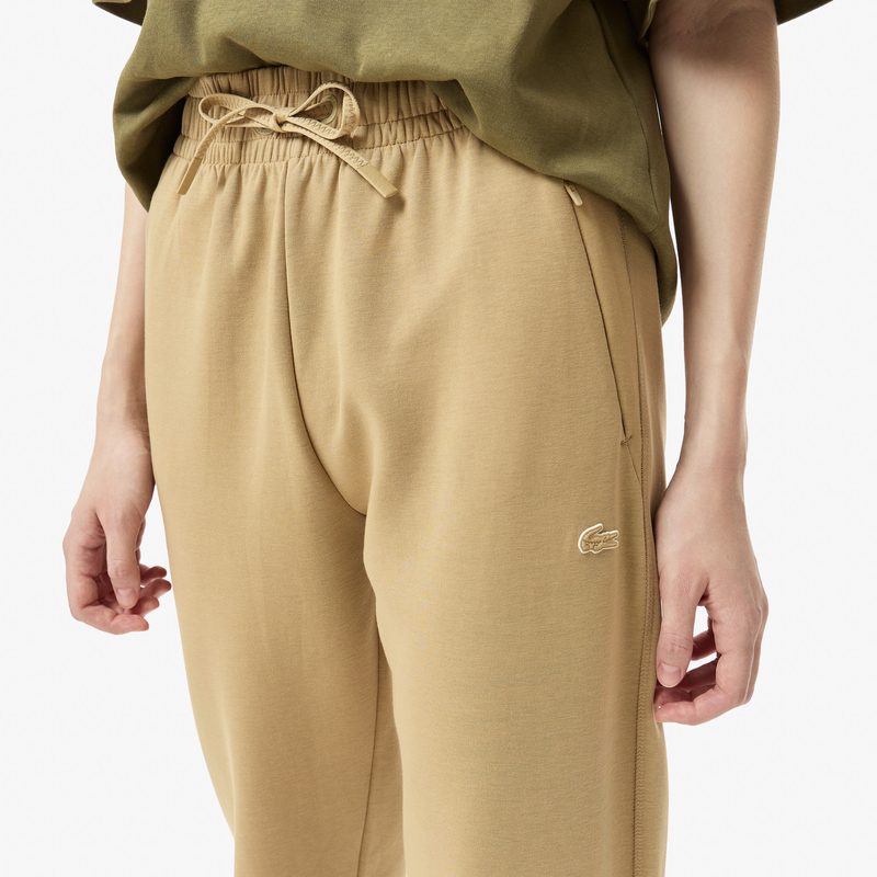 Женские спортивные брюки Lacoste из хлопка 4