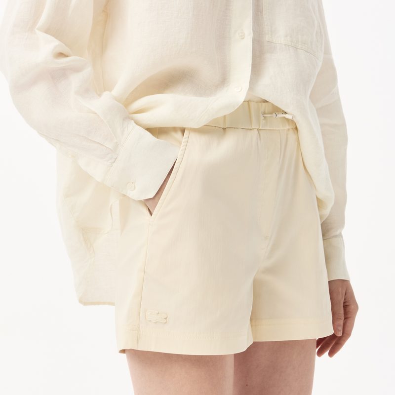 Женские короткие однотонные шорты Lacoste 5
