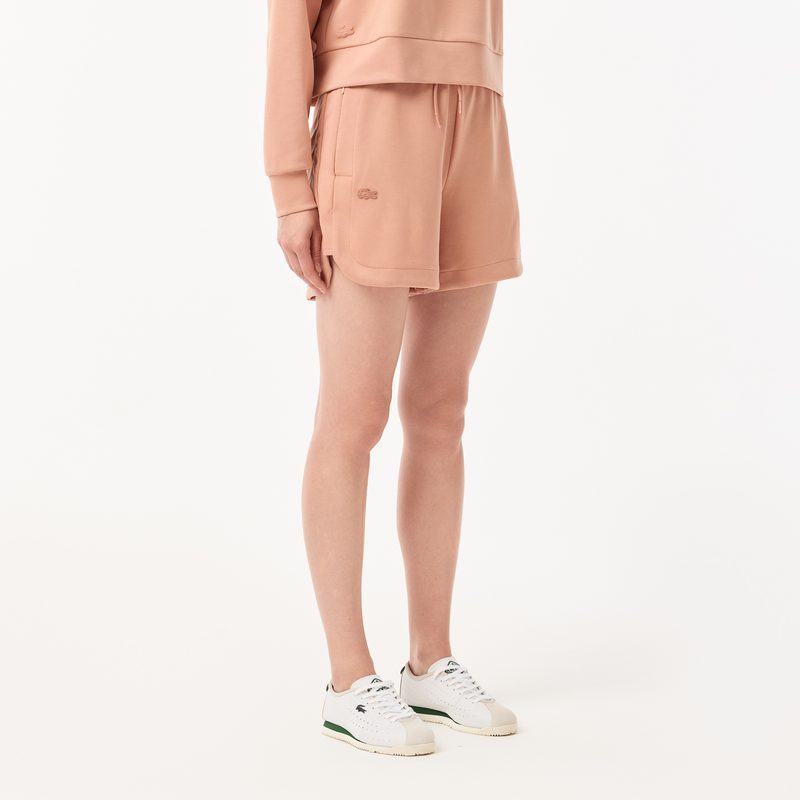 Женские спортивные шорты Lacoste с карманами 3