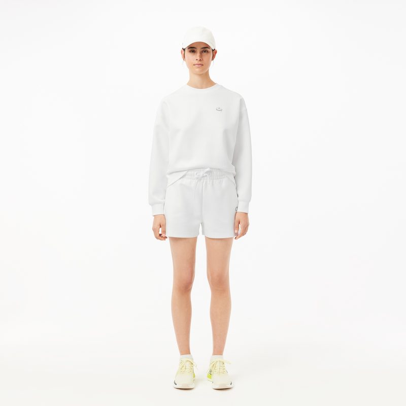 Женские однотонные шорты Lacoste 3
