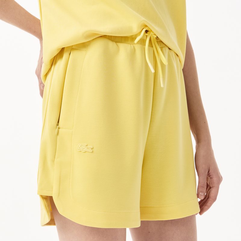 Женские спортивные шорты Lacoste с карманами 4