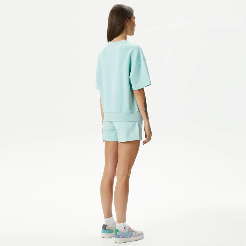 Женские короткие однотонные шорты Lacoste 2