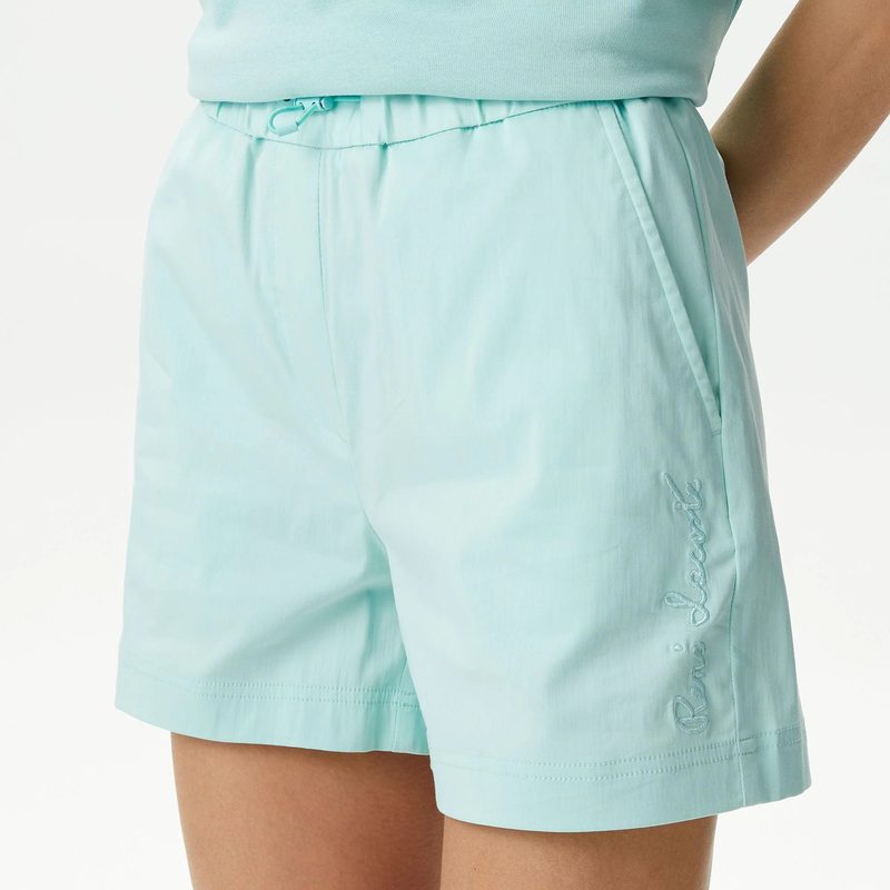 Женские короткие однотонные шорты Lacoste 4