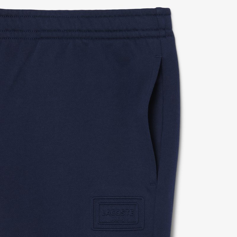 Хлопковые спортивные брюки Lacoste унисекс 5