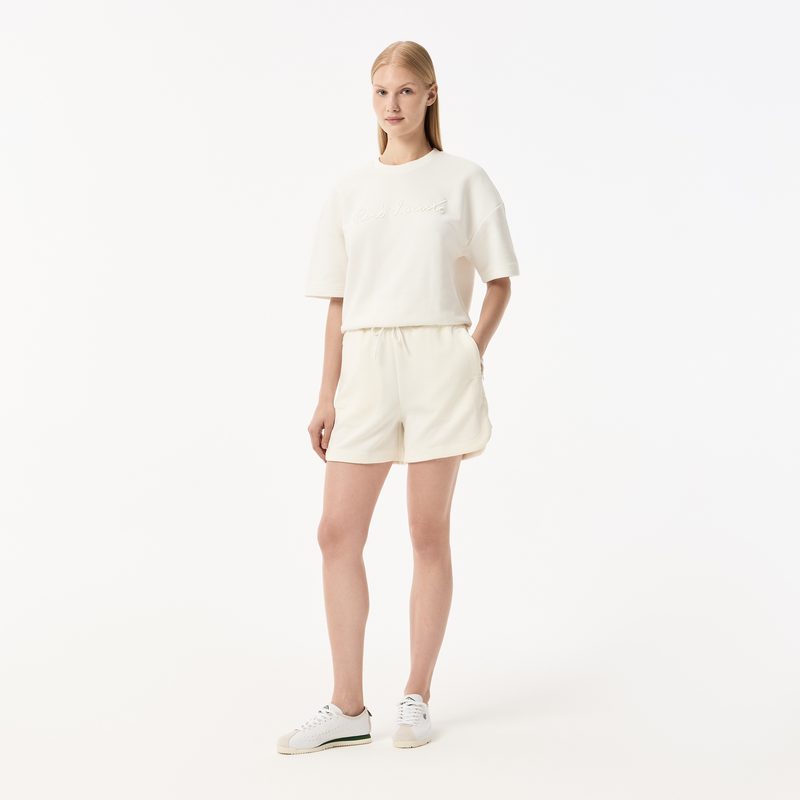 Женские спортивные шорты Lacoste с карманами
