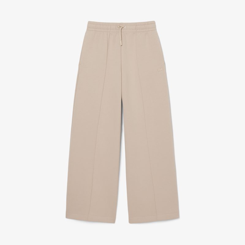 Женские хлопковые спортивные брюки-клёш Lacoste 4