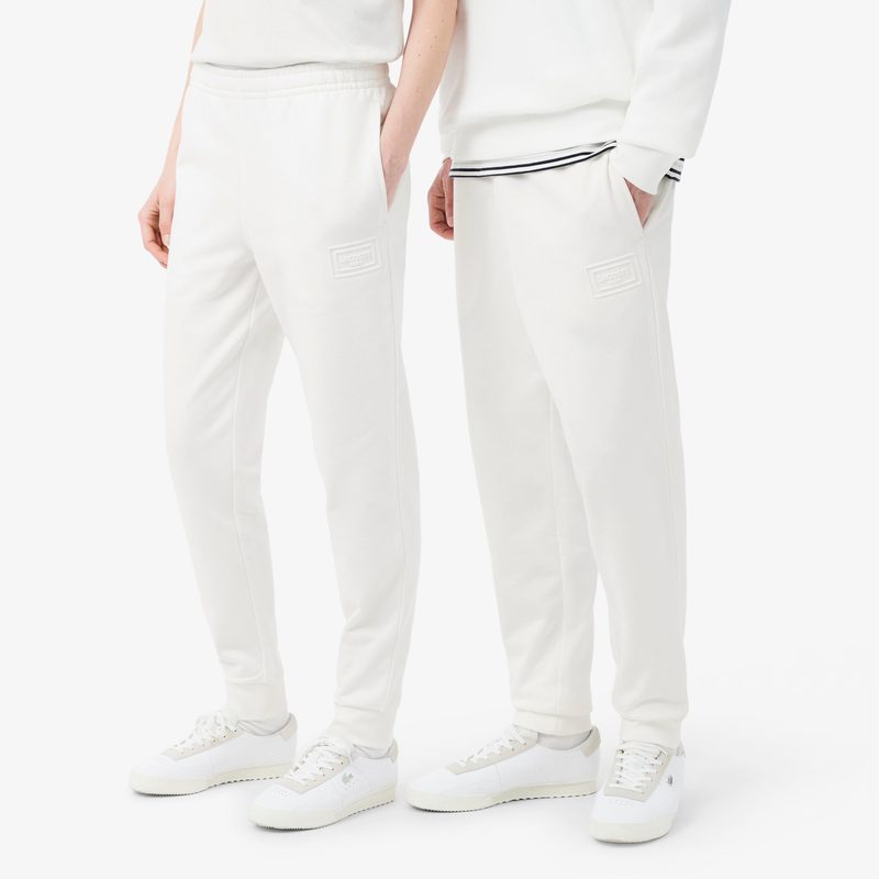 Хлопковые спортивные брюки Lacoste унисекс 2