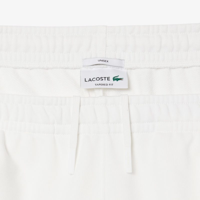 Хлопковые спортивные брюки Lacoste унисекс 5